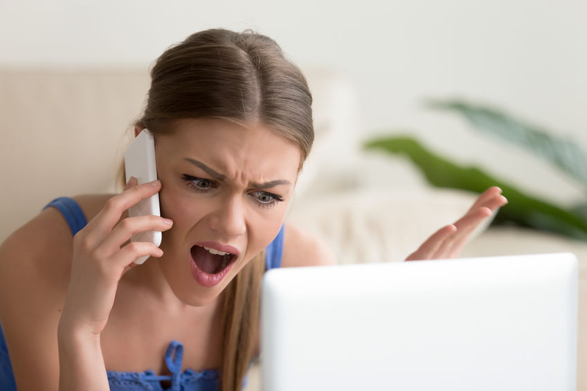fix bad reviews Angry woman giving bad Google review